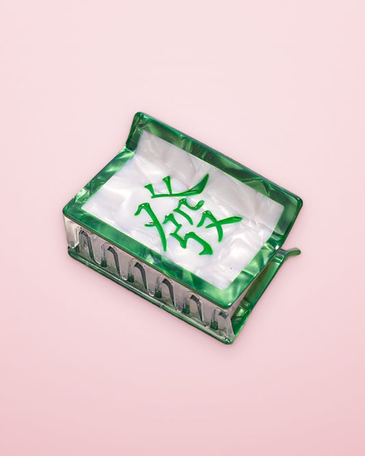 Green Dragon mahjong tile acetate claw clip on a blush pink background