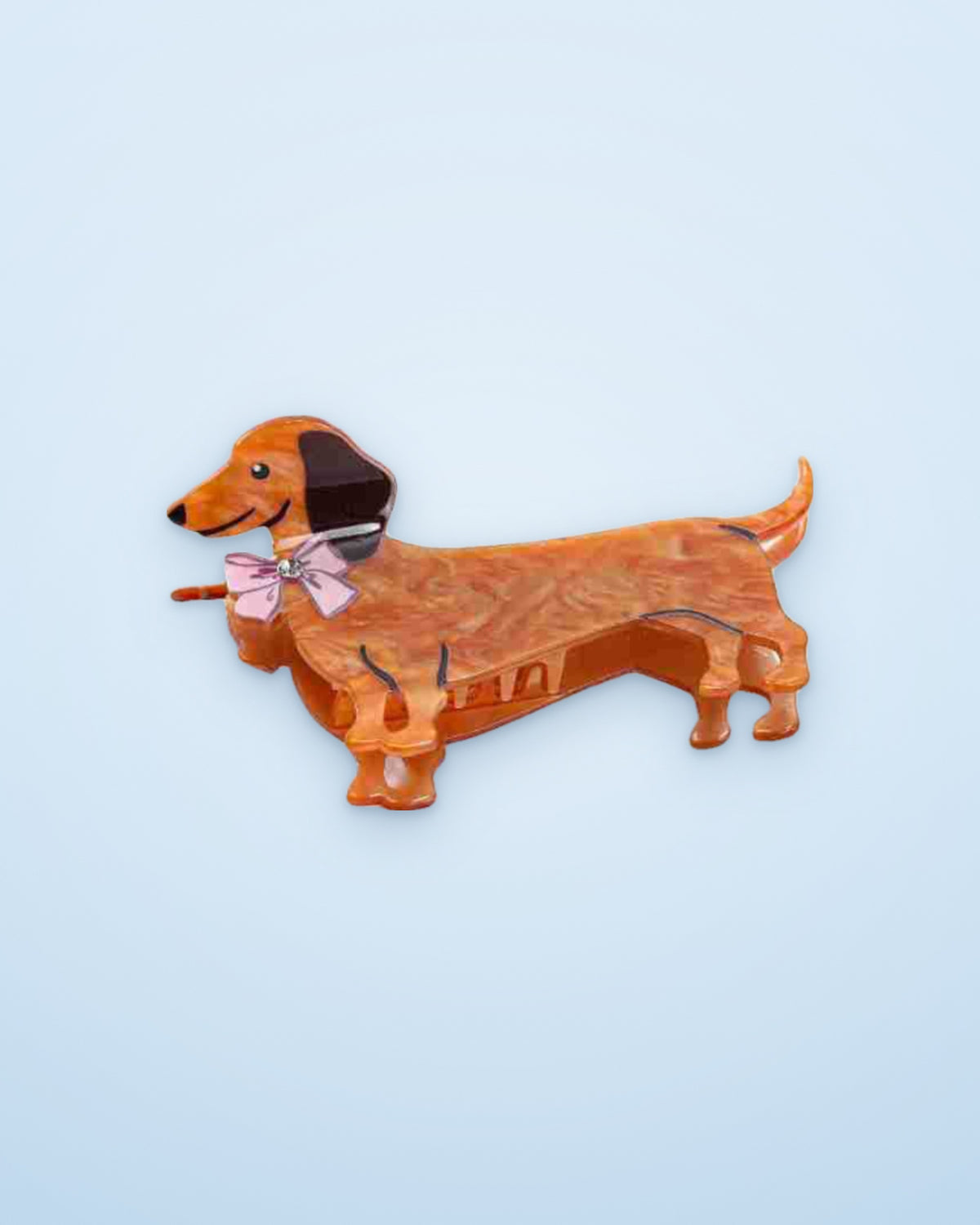 Pink Bow Doxie dachshund claw clip on a sky blue background