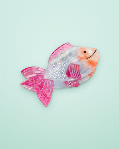 Pink Fin Fish acetate claw clip on a seafoam background