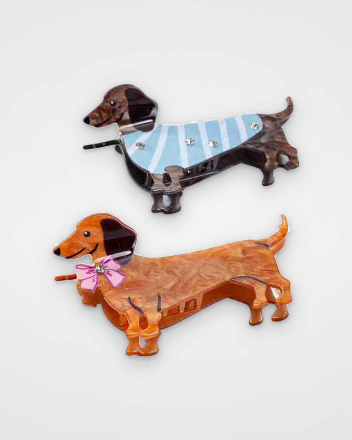 Dachshund acetate claw clips — Sweater Weather Doxie and Pink Bow Doxie on a light gray background