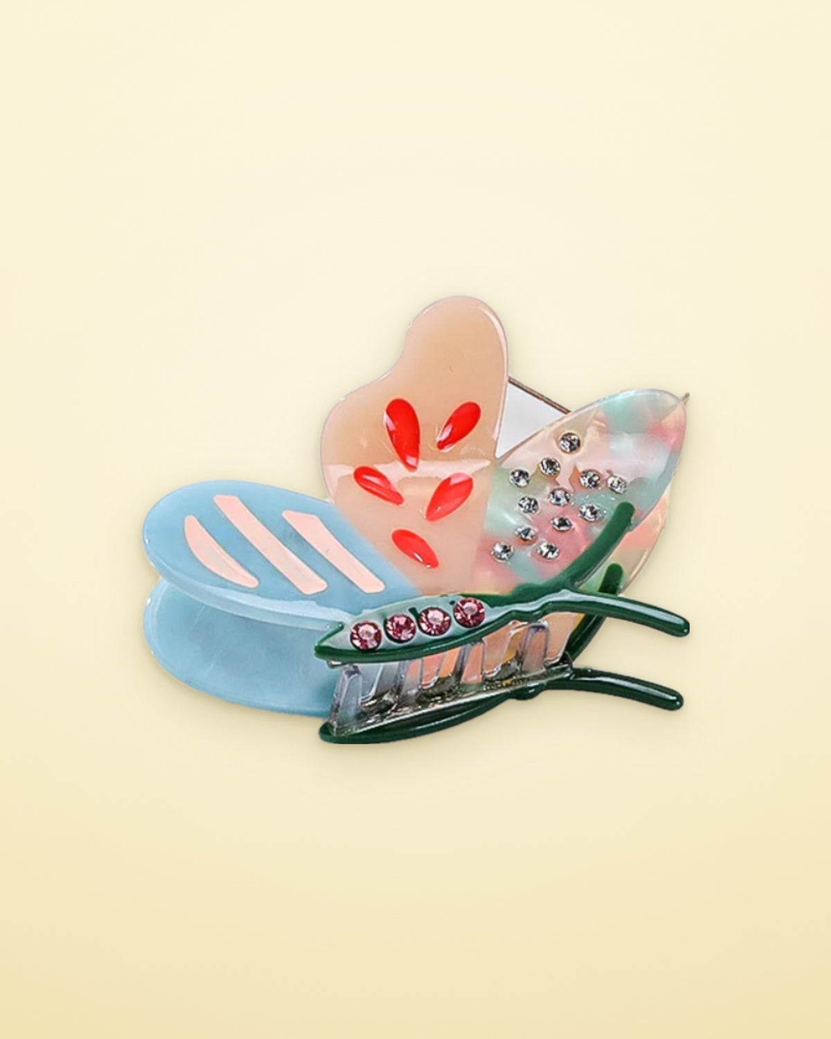 Cotton Candy Sky butterfly acetate claw clip on a butter yellow background