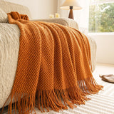 Caramel textured knit throw blanket with tassels