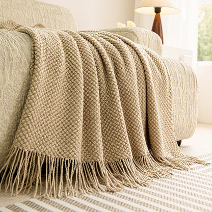 Oatmeal textured knit throw blanket with tassels