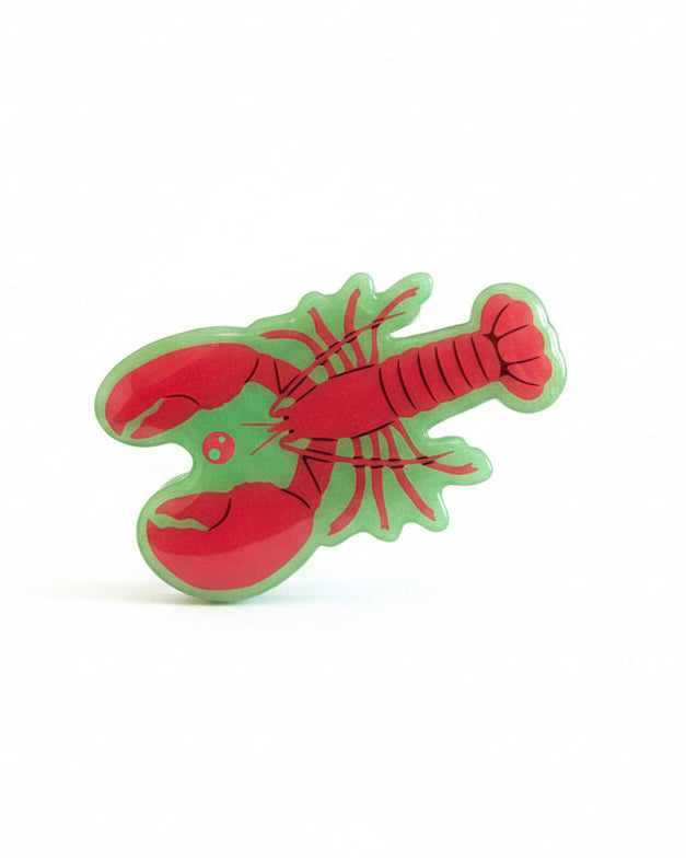 Red lobster-shaped acrylic claw hair clip with a translucent mint-green edge