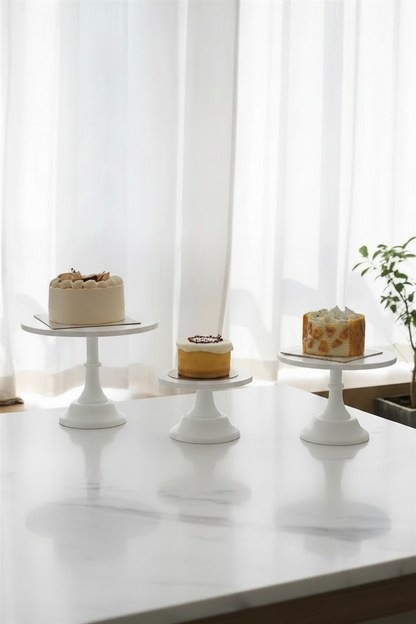 White Nordic cake stands lifestyle hero shot with cakes