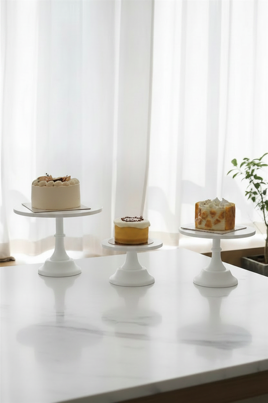 White Nordic cake stands lifestyle hero shot with cakes