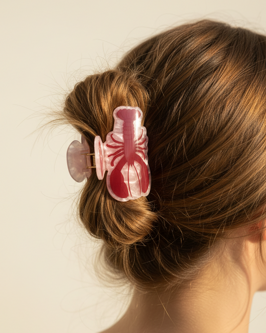 Lobster claw hair clip worn in a casual bun