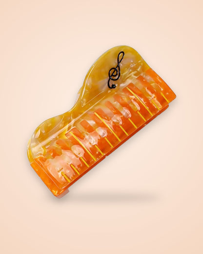 Marmalade Grand orange piano acetate claw clip with treble clef